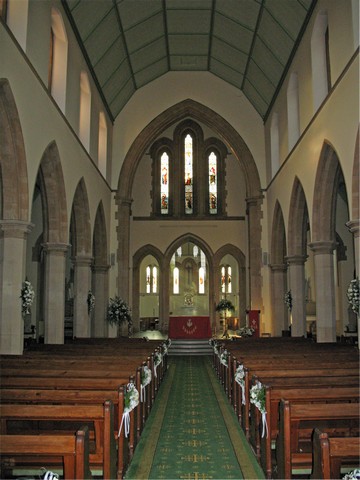 Interior of church St Thomas of Canterbury looking towards altar.