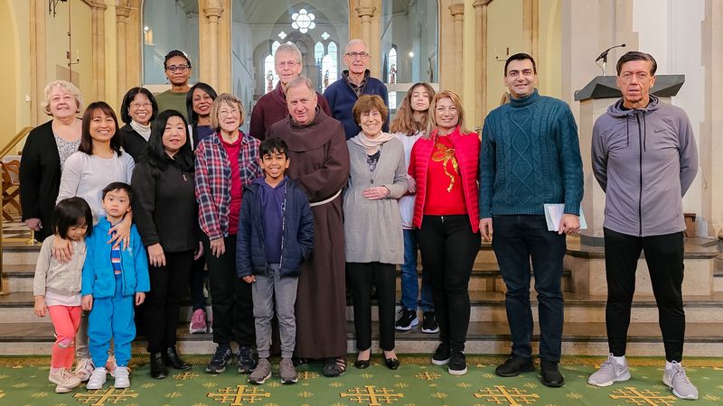 Group members in front of altar